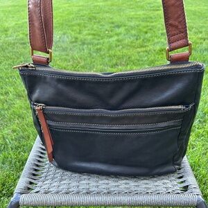 Fossil Corey Black Leather Crossbody with Brown Strap & Multiple Pockets.